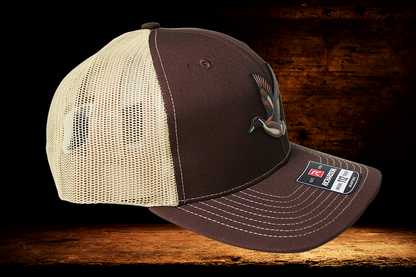 Brown and tan hat with brown flying duck
