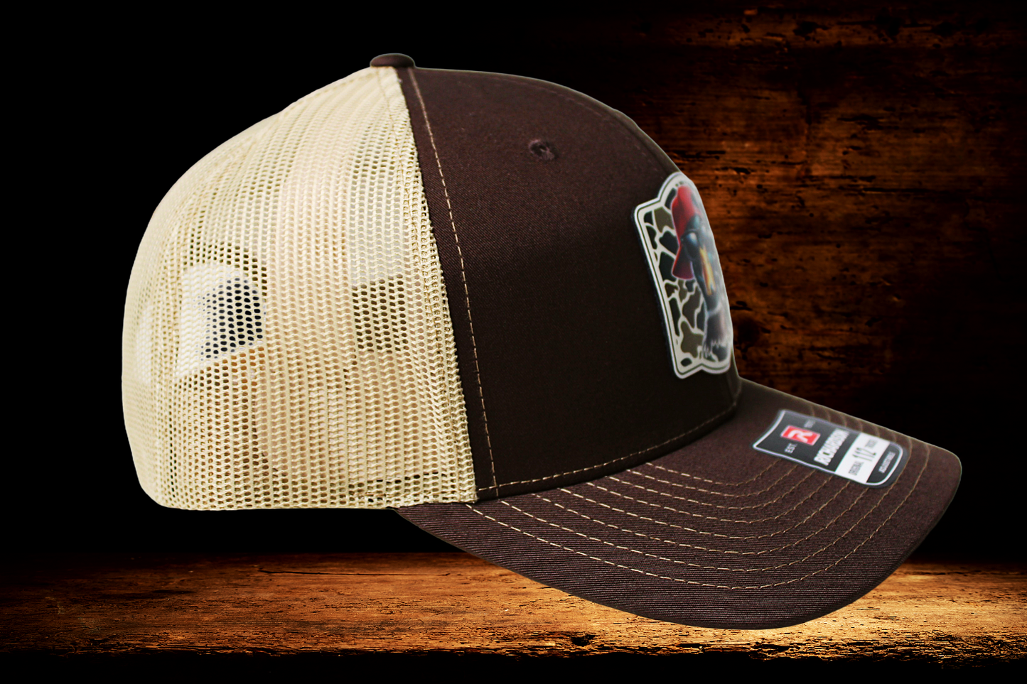 Brown and tan hat with cool duck patch