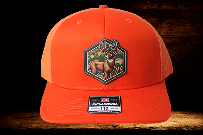 Hunting orange hat with colorful deer patch