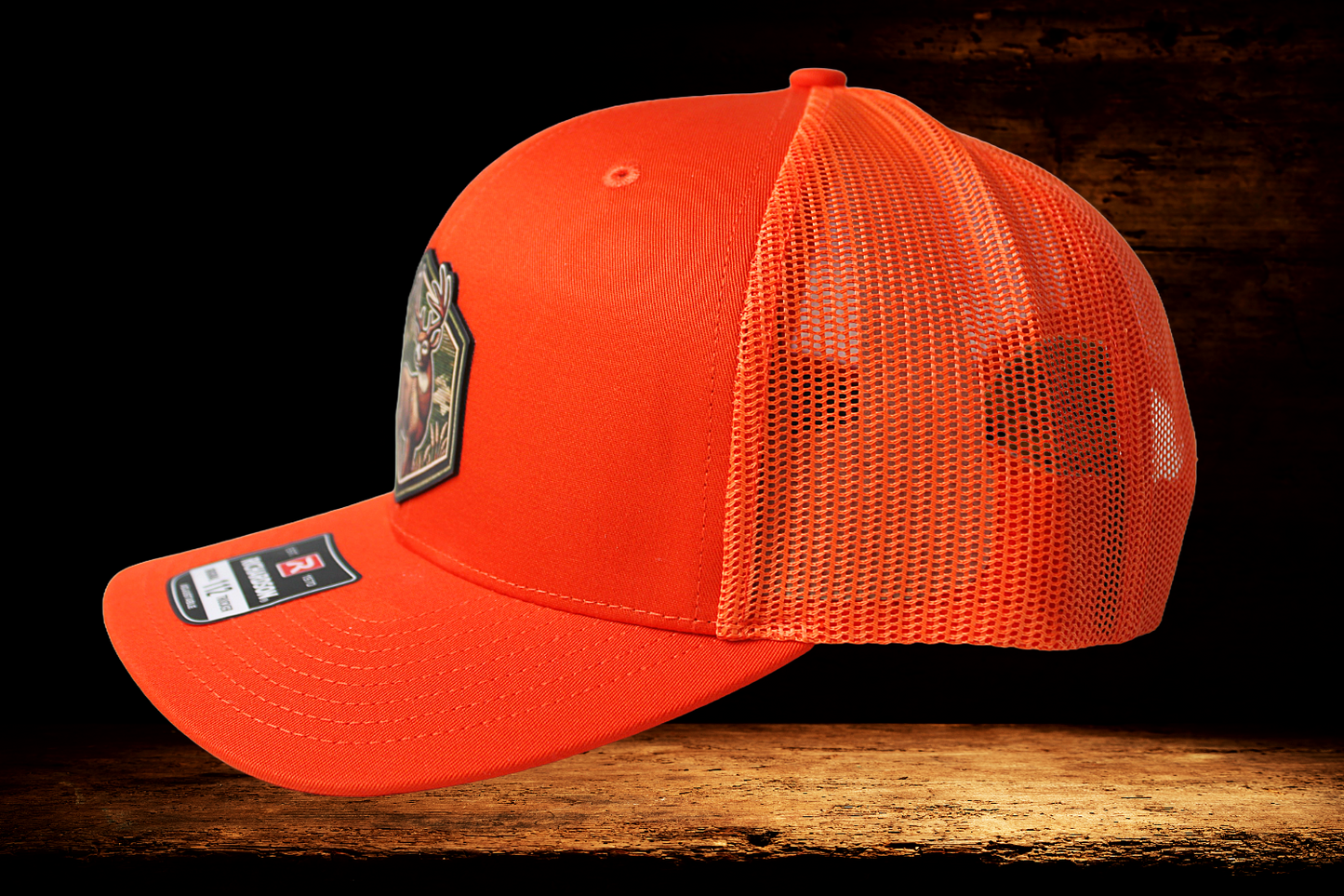 Hunting orange hat with colorful deer patch