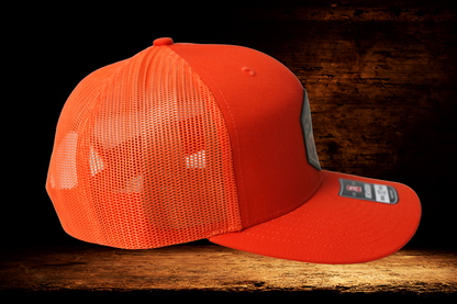 Hunting orange hat with colorful deer patch