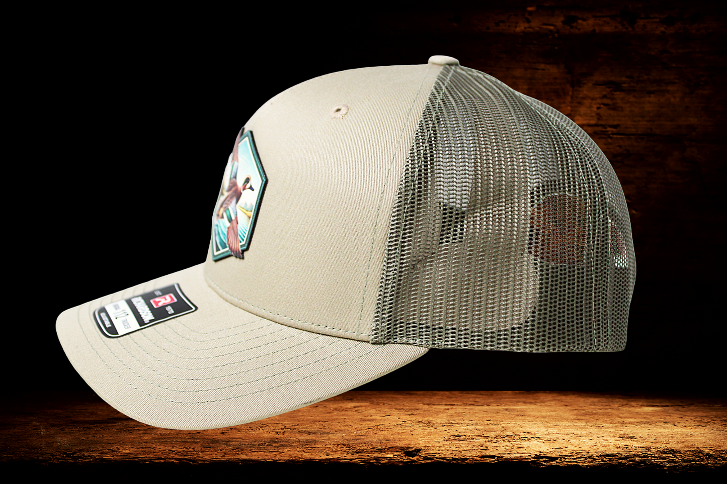 Flying duck portrait on khaki hat